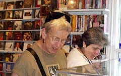 Senior Lesbians browsing at Womancrafts